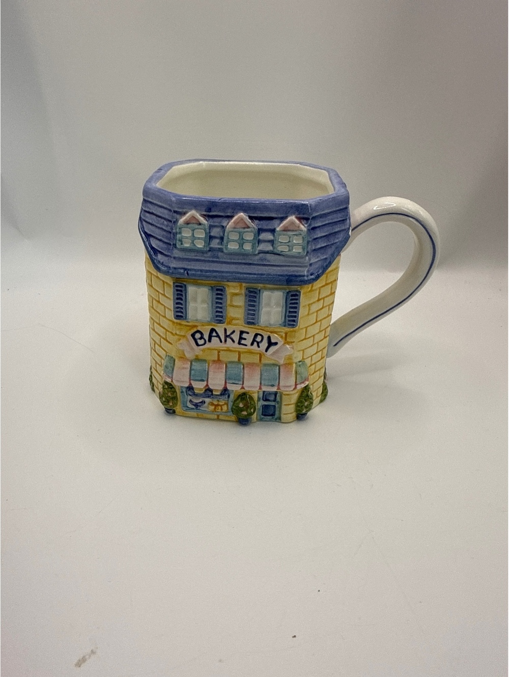 vintage Avon Cottage Collection "Bakery" ceramic mug blue building